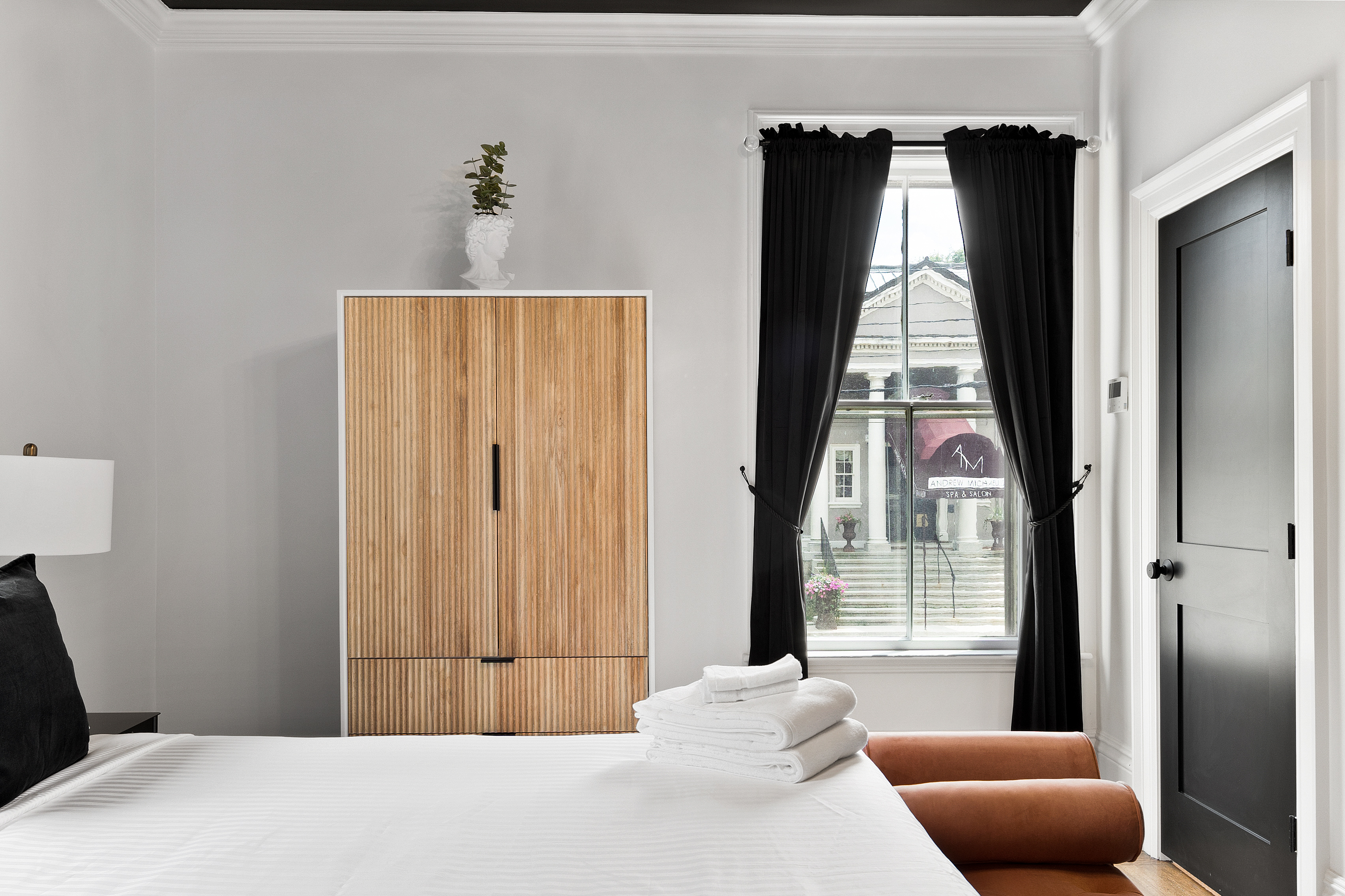 Elegant armoire detail in The Coach House luxury boutique hotel