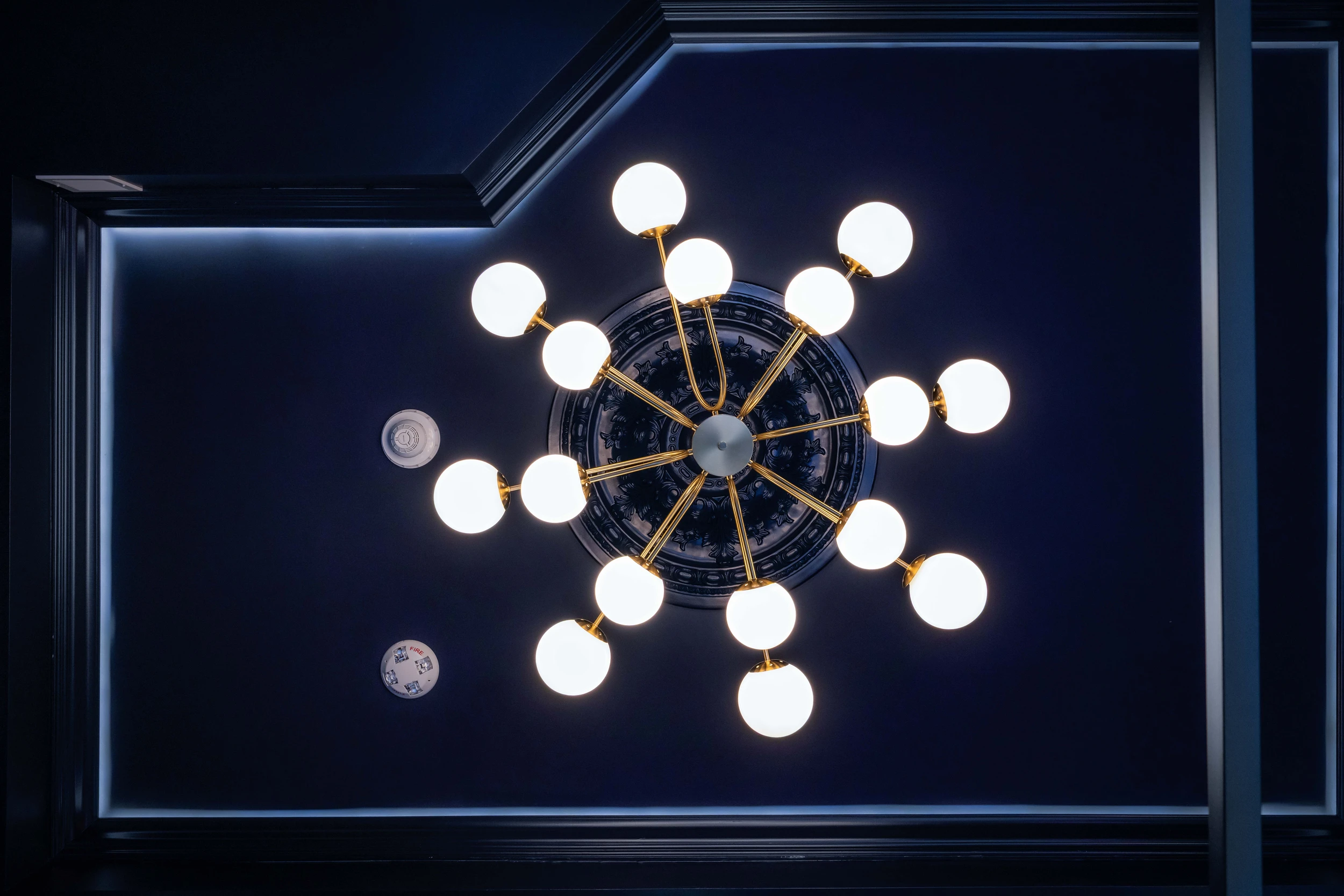 Ceiling chandelier detail in The Highliner boutique hotel